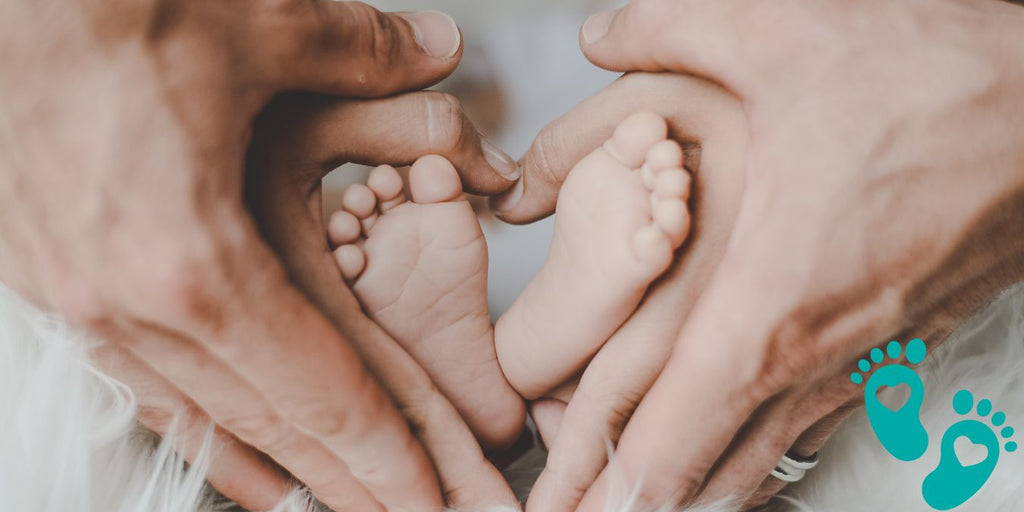 Parent's hands forming a heart shape around baby's feet, discussing the benefits of sock shoes for babies and the best times to use them with Grookz Shoes