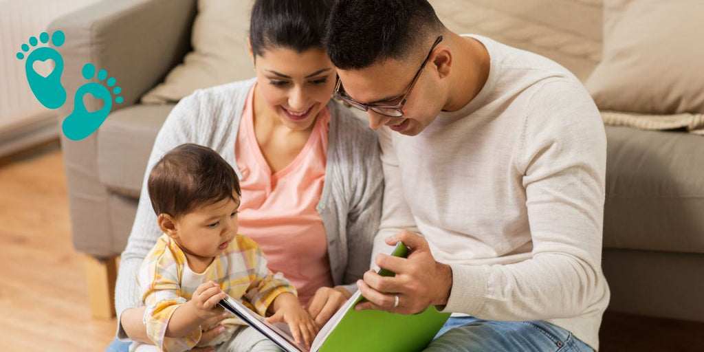 Parents reading a book with their baby, emphasizing cognitive development and the importance of Grookz baby shoes